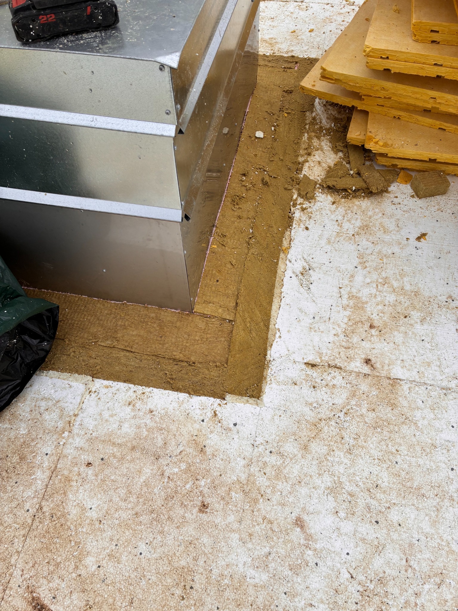 Mineral wool fire protection around roof hatch