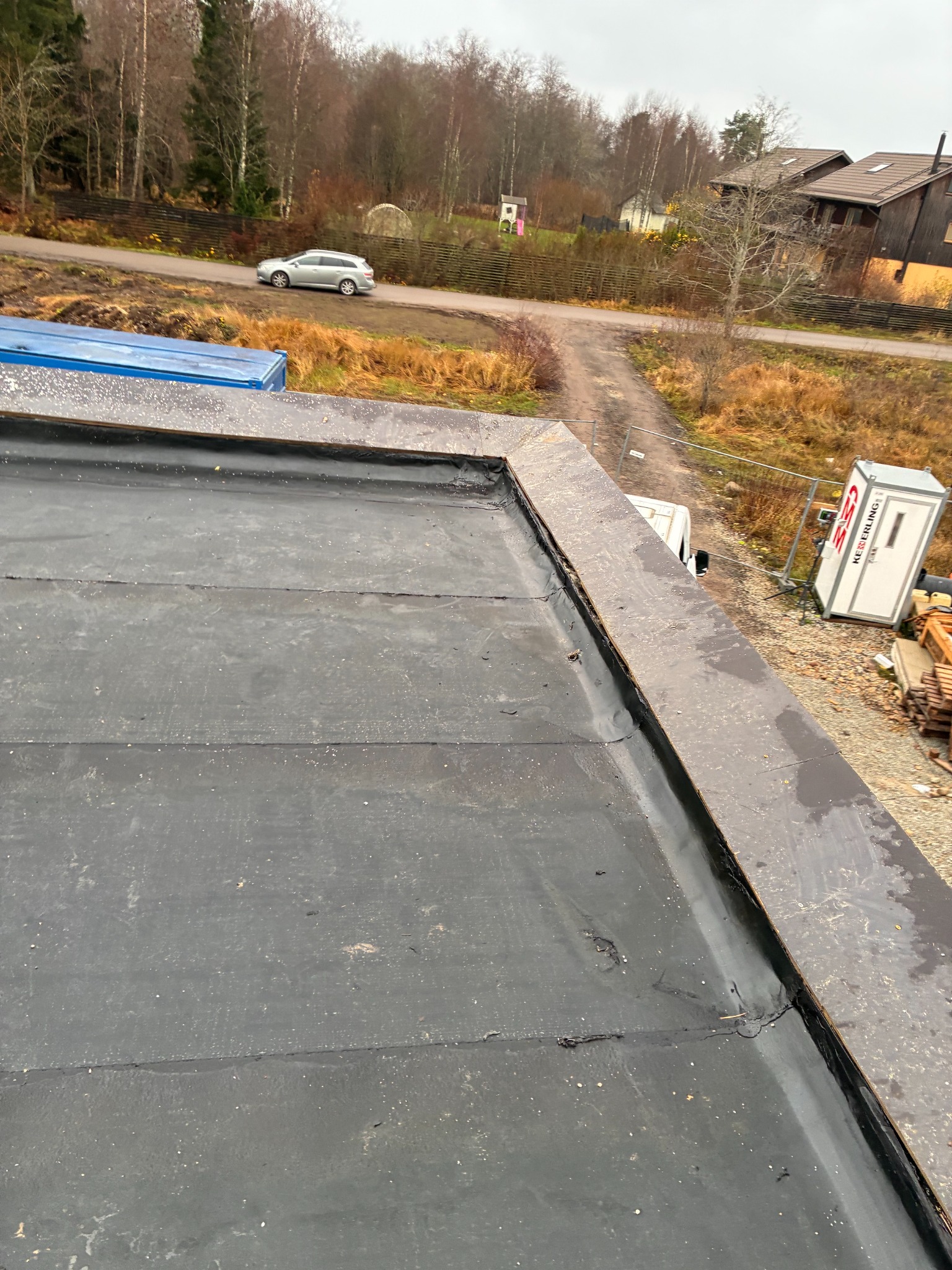 Timber and plywood parapet construction