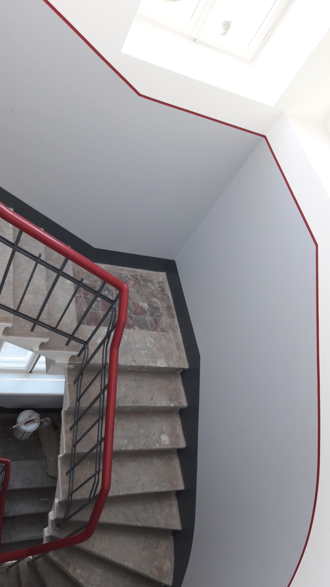 Restored stairwell railings and wall finish at Narva mnt 57