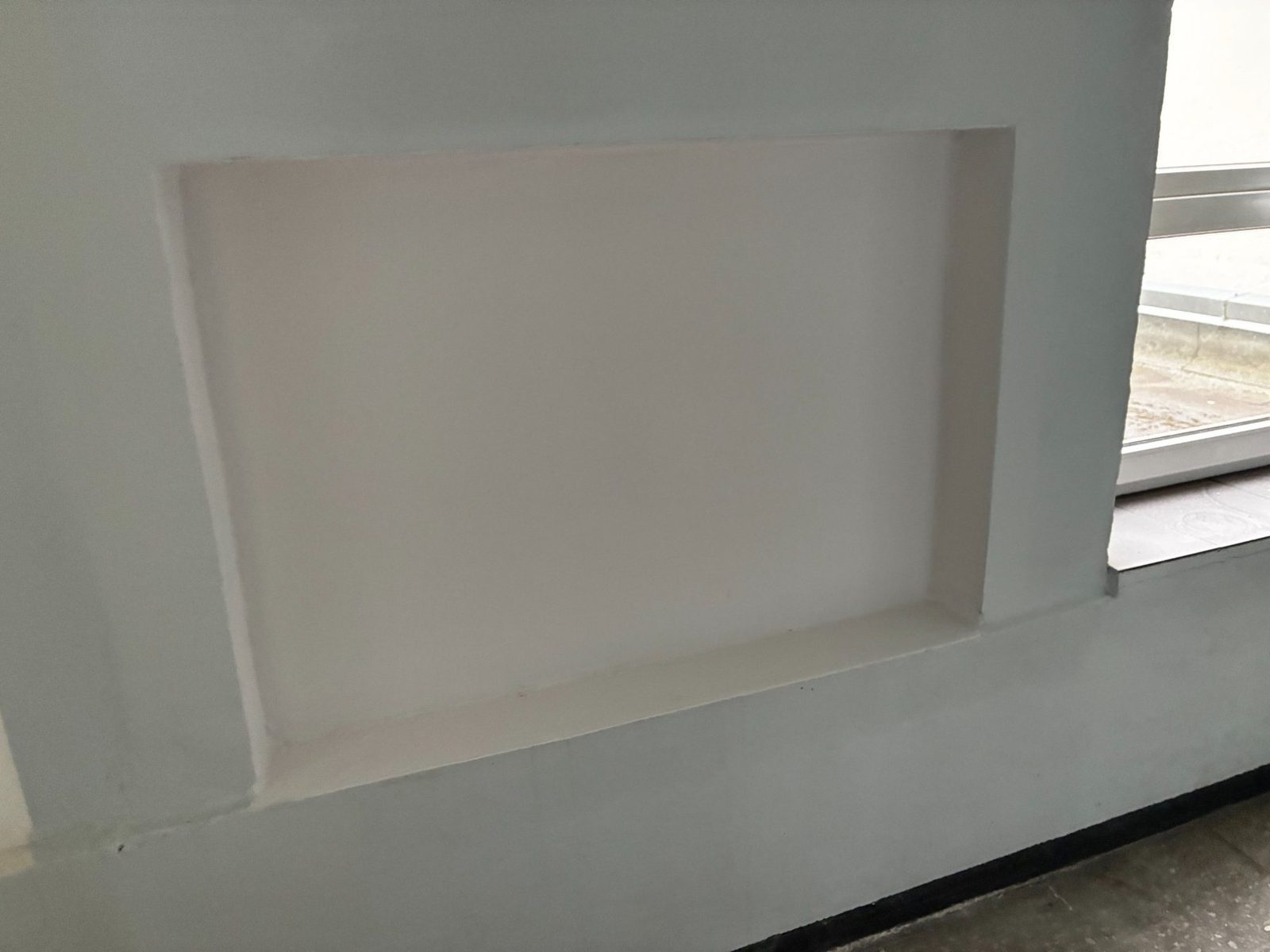 Finished recess with clean edges and consistent coating.
