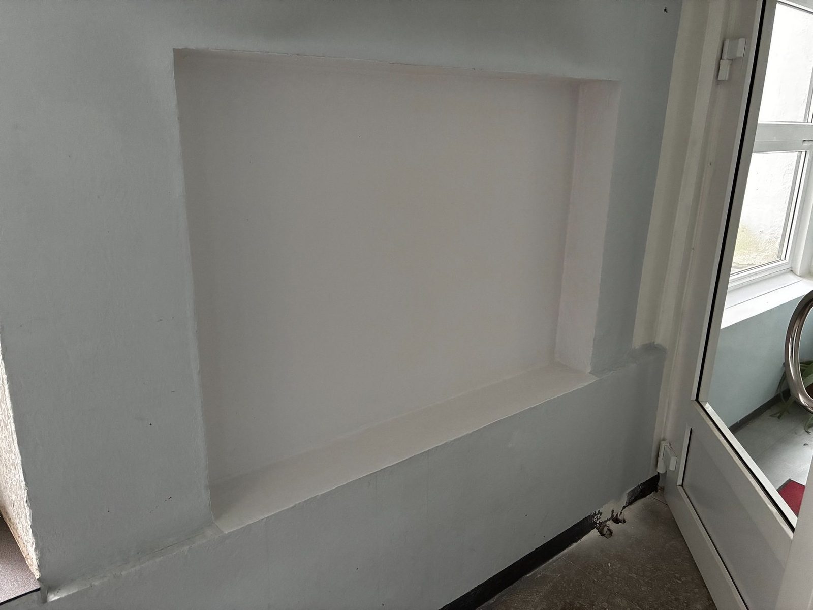 Completed local repair around former radiator position.