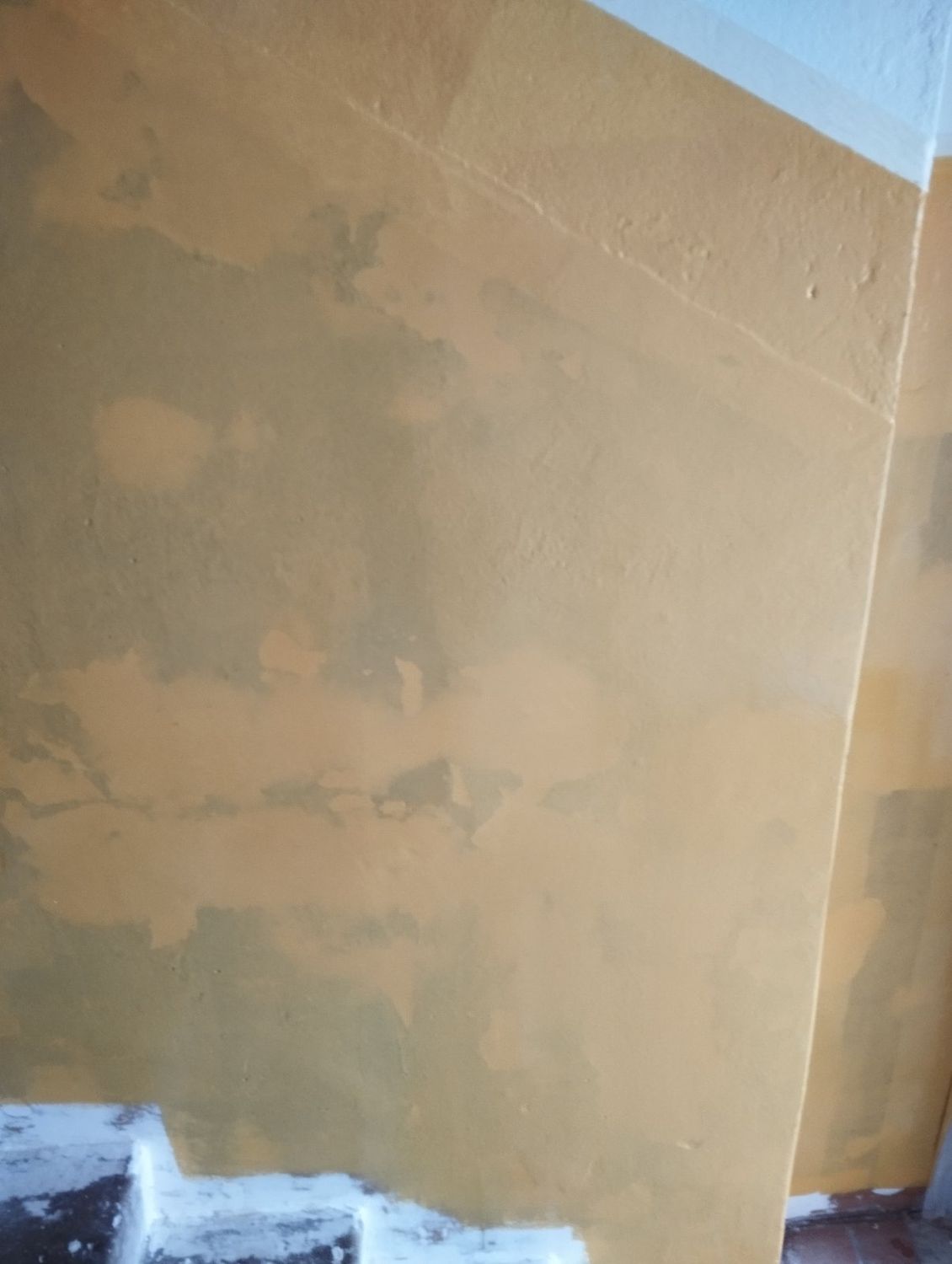 Wall preparation before final painting.