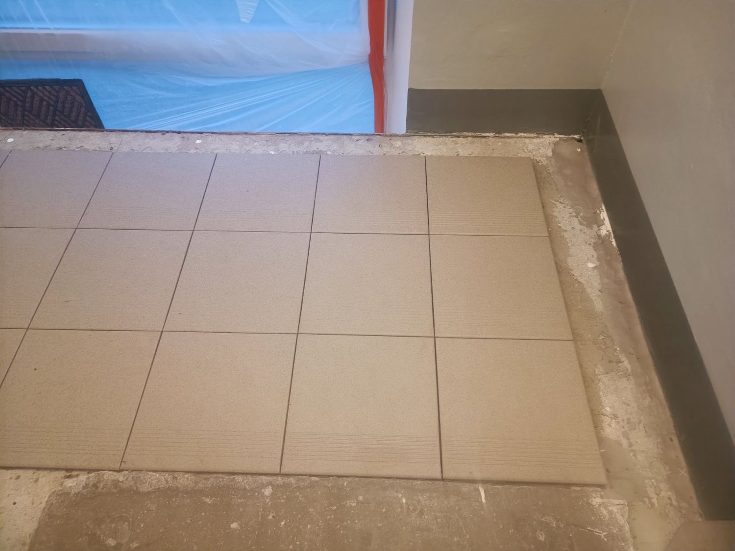 New floor tiles installed on the landing.