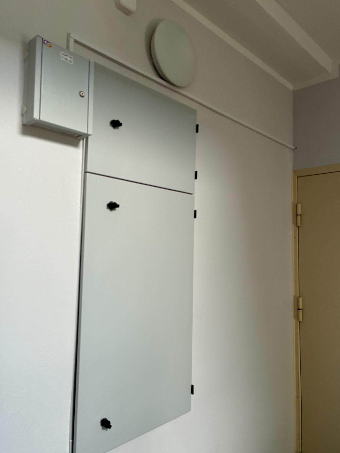 New electrical cabinet doors after renovation.
