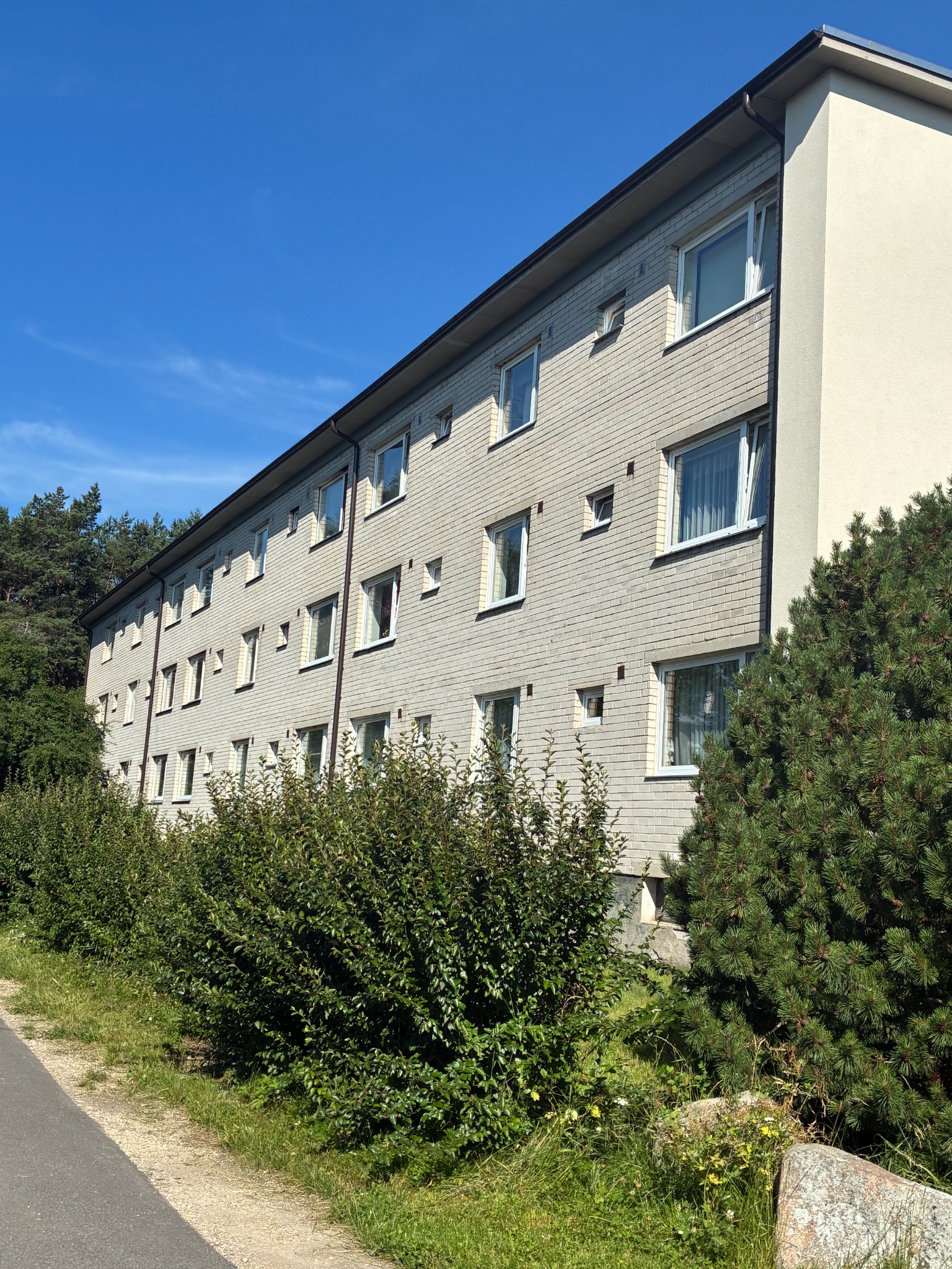 Long brick elevation of the apartment building
