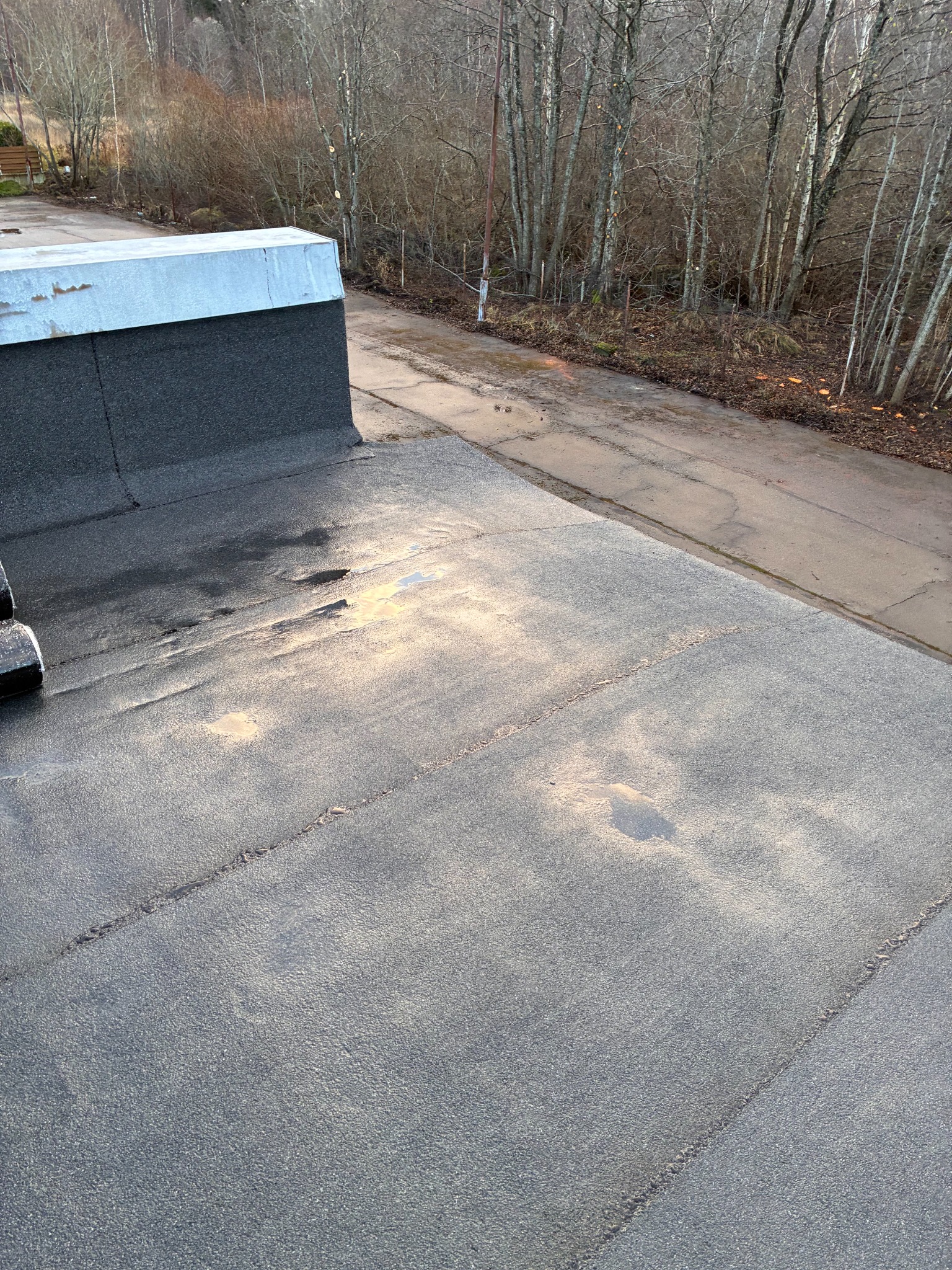 After renovation: completed parapet corner and SBS junction