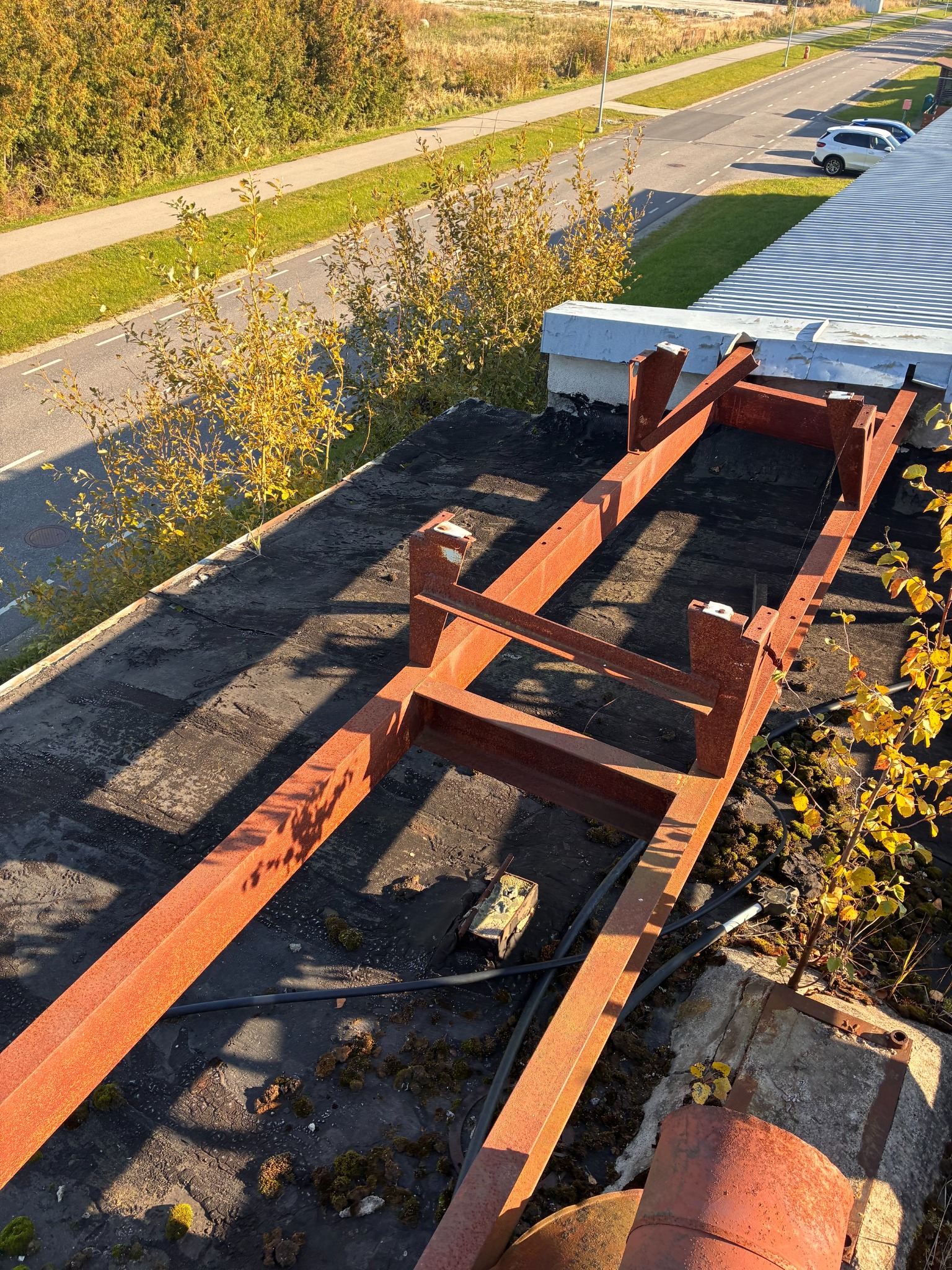 Before renovation: aged membrane at parapet